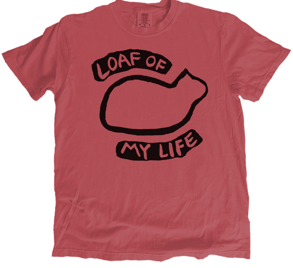 Red t-shirt with black graphic and text 'Loaf of My Life' on a white background