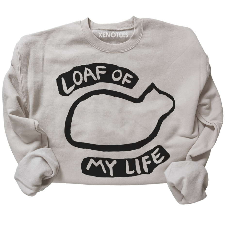 Beige sweatshirt with black graphic and text 'LOAF OF MY LIFE' on a white background