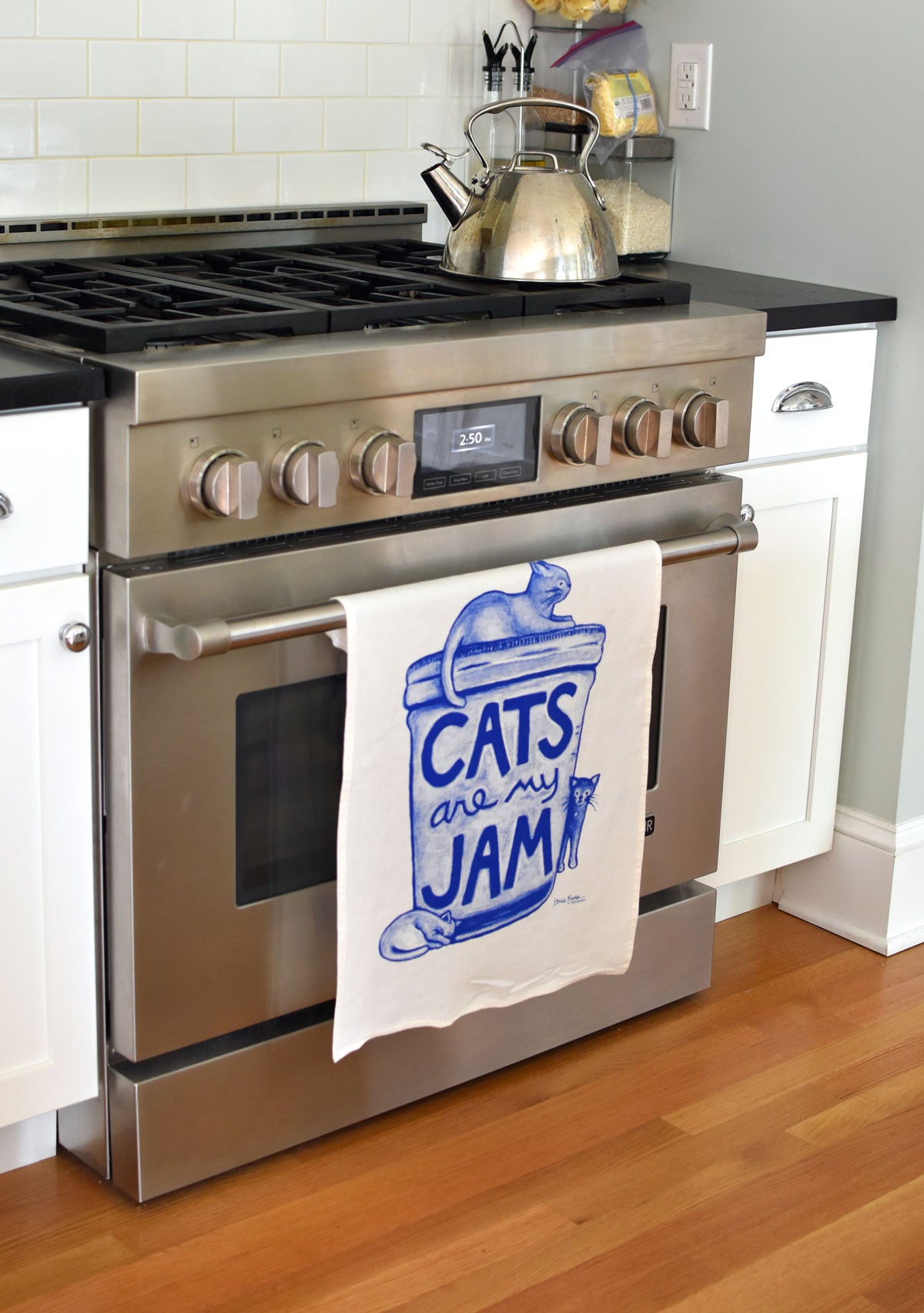 Funny cat lover flour sack kitchen towel with “Cats Are My Jam” illustration, hand screen printed in the USA